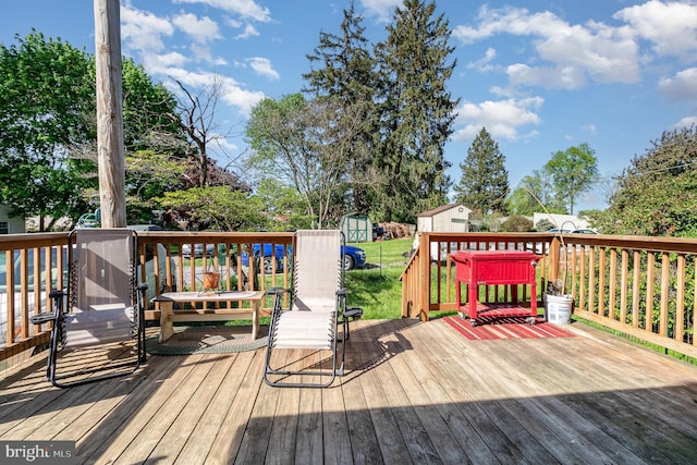 309 N N Morris St, Shippensburg, PA 17257 - wooden terrace with a storage unit and an outdoor structure