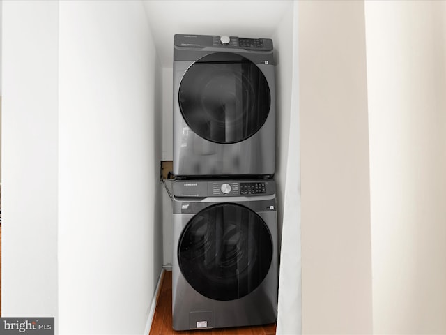623 Second St, Annapolis, MD 21403 - laundry area featuring stacked washer / dryer and wood finished floors