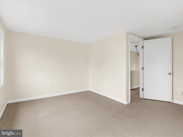 623 Second St, Annapolis, MD 21403 - unfurnished bedroom with carpet and baseboards