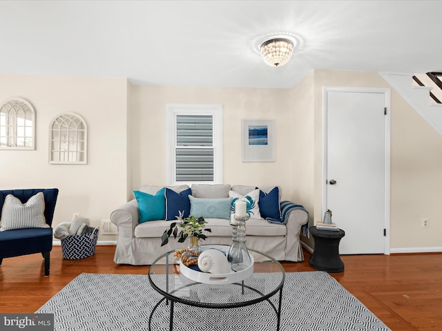 623 Second St, Annapolis, MD 21403 - living area featuring wood finished floors, baseboards, and a chandelier