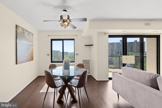 307 Yoakum Pkwy Unit 821, Alexandria, VA 22304 - dining space featuring plenty of natural light, dark wood-style floors, and a ceiling fan