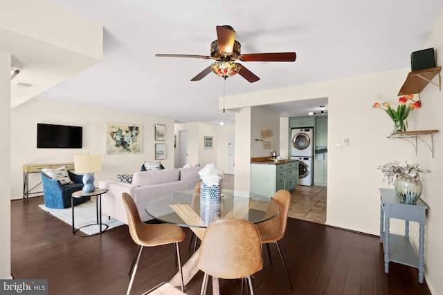 307 Yoakum Pkwy Unit 821, Alexandria, VA 22304 - dining space with stacked washer and clothes dryer, ceiling fan, and dark wood finished floors