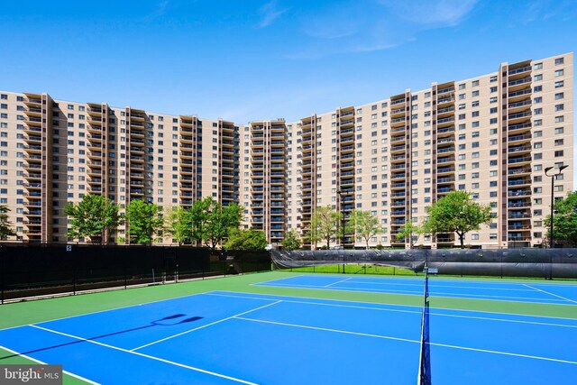 307 Yoakum Pkwy Unit 821, Alexandria, VA 22304 - view of tennis court featuring community basketball court and fence