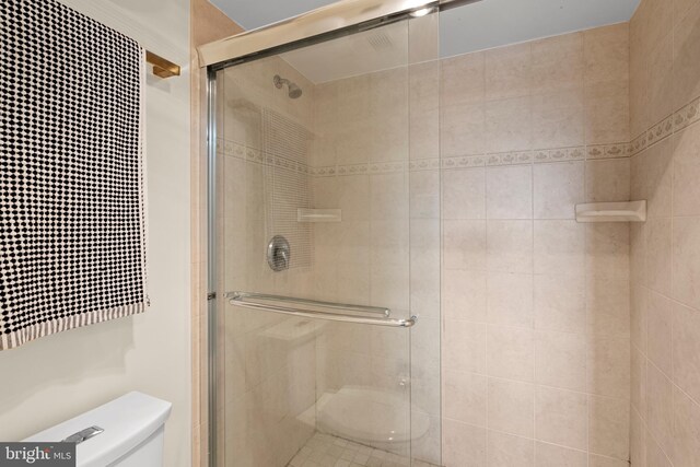307 Yoakum Pkwy Unit 821, Alexandria, VA 22304 - bathroom with toilet and a stall shower