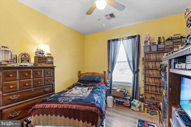 15 Sutton Pl, Helmetta, NJ 08828 - bedroom with ceiling fan, visible vents, and wood finished floors