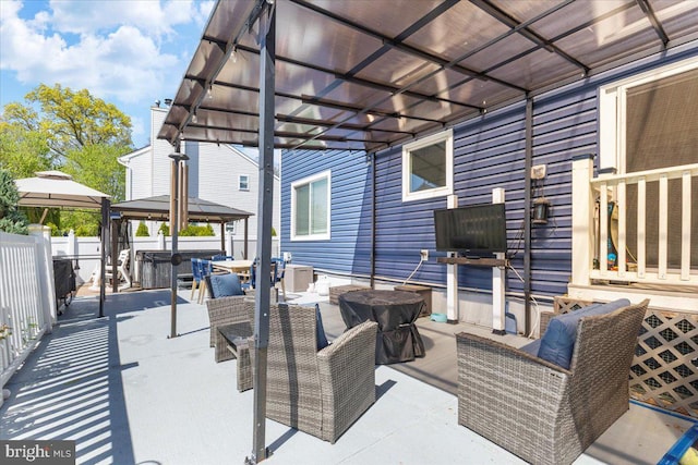 15 Sutton Pl, Helmetta, NJ 08828 - view of patio featuring central air condition unit, a gazebo, fence, and outdoor dining area