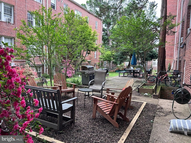 surrounding community with a patio area