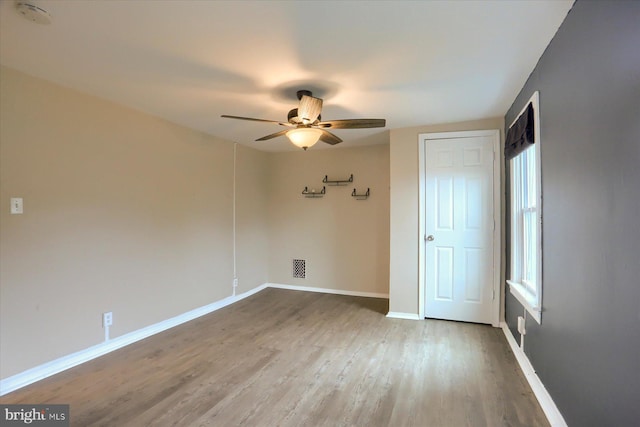 235 Wyoming Ave, Enola, PA 17025 - spare room with wood finished floors, a ceiling fan, baseboards, and a smoke detector