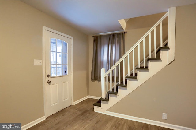 235 Wyoming Ave, Enola, PA 17025 - entrance foyer featuring stairs, baseboards, and wood finished floors