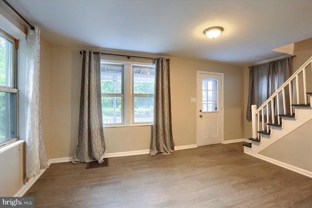 235 Wyoming Ave, Enola, PA 17025 - entryway with healthy amount of natural light, stairs, and wood finished floors