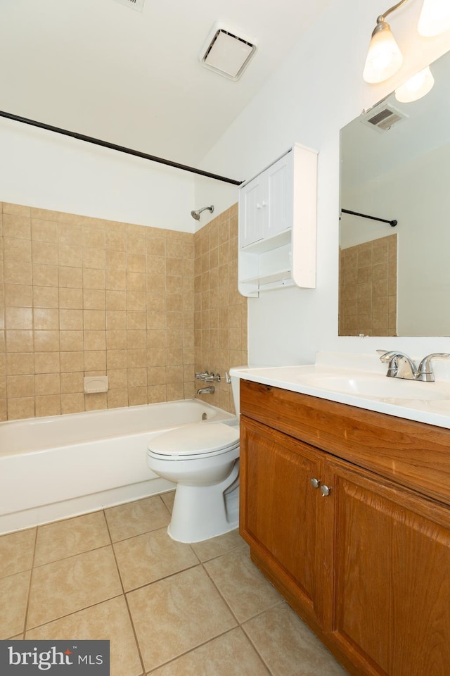 bathroom with toilet, visible vents, tile patterned flooring, and shower / bathtub combination