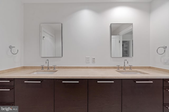 full bathroom featuring double vanity