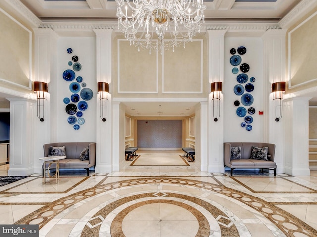 building lobby featuring a high ceiling and crown molding