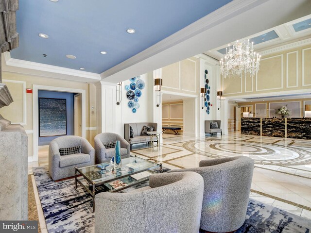 building lobby with ornamental molding and recessed lighting