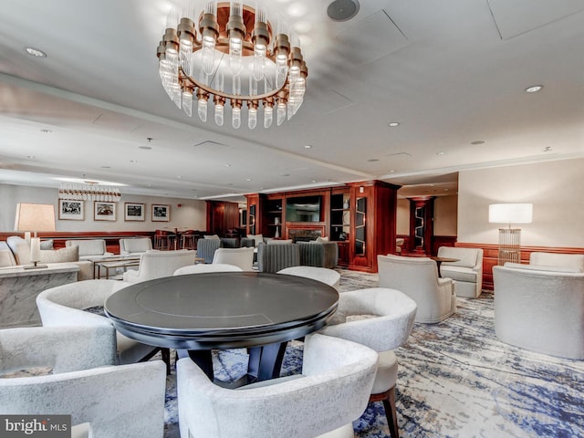 common area featuring a wainscoted wall and recessed lighting