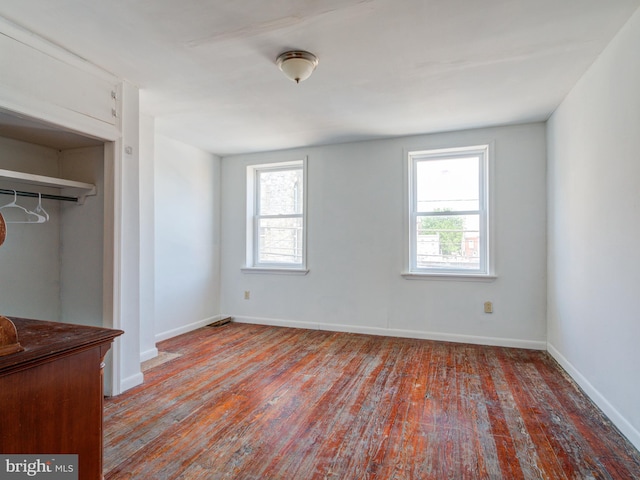 2030-32 E Somerset St, Philadelphia, PA 19134 - unfurnished bedroom featuring hardwood / wood-style flooring, baseboards, and a closet