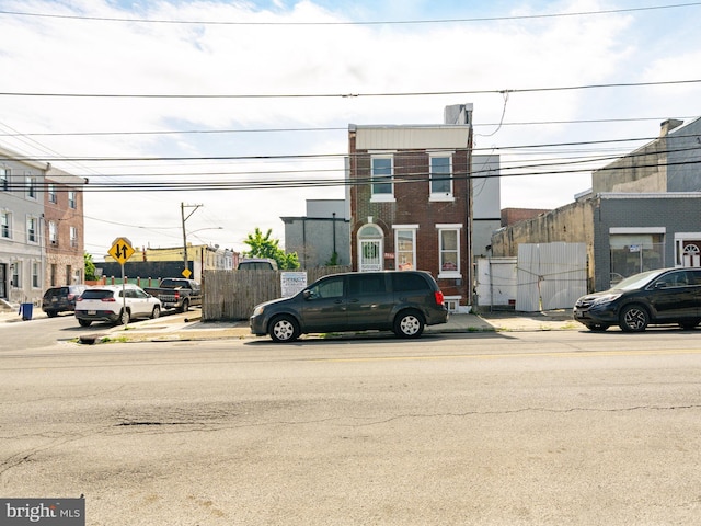 2030-32 E Somerset St, Philadelphia, PA 19134 - view of asphalt road featuring traffic signs, street lighting, sidewalks, and curbs