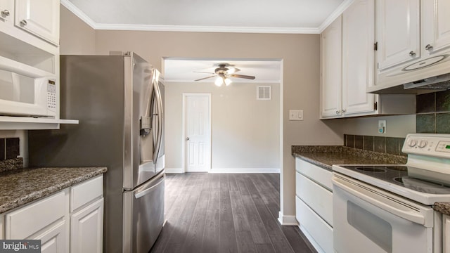 kitchen featuring white appliances, crown molding, a ceiling fan, white cabinets, and baseboards