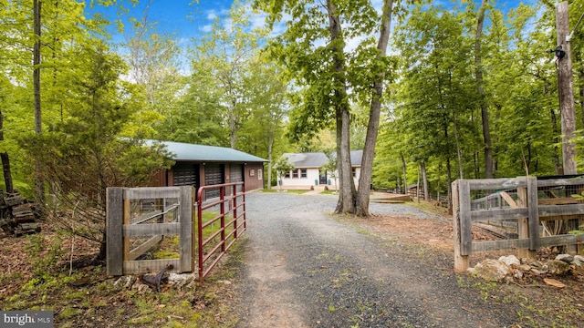 view of street featuring a gated entry