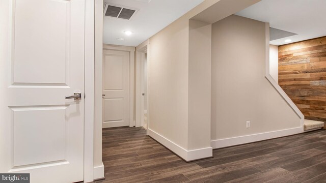 hallway with dark wood-style flooring, recessed lighting, and baseboards
