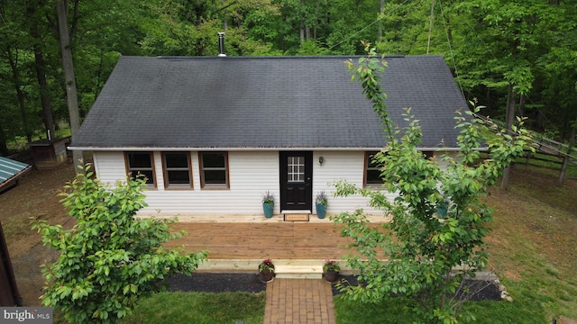 view of front of home featuring a wooden deck