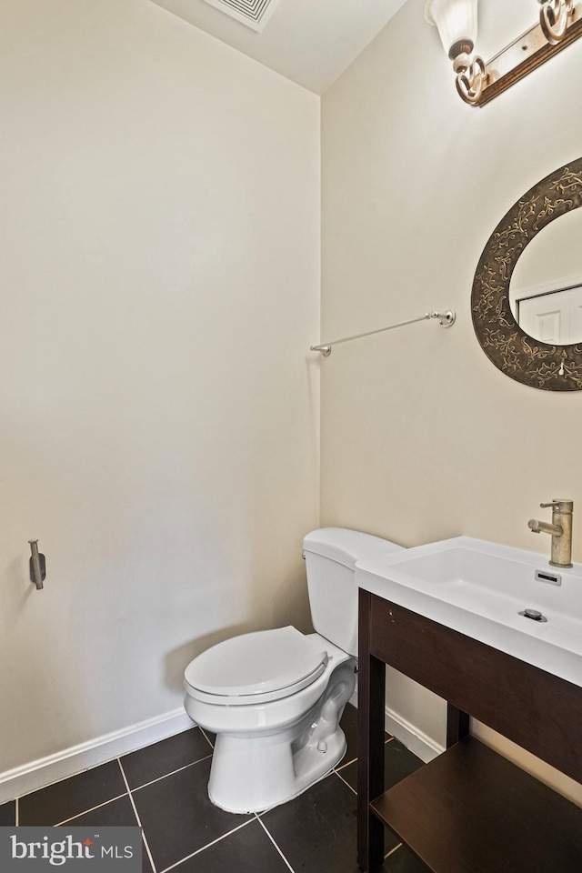 5823 Field Pl NE, Washington, DC 20019 - half bath with toilet, tile patterned floors, vanity, and visible vents