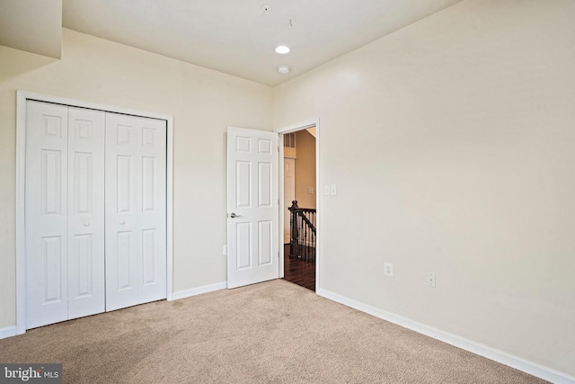 5823 Field Pl NE, Washington, DC 20019 - unfurnished bedroom with a closet, baseboards, and carpet floors
