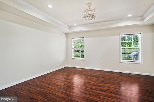 5823 Field Pl NE, Washington, DC 20019 - empty room with crown molding, a raised ceiling, and a notable chandelier