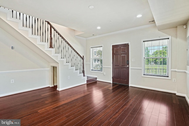 5823 Field Pl NE, Washington, DC 20019 - entrance foyer with a wealth of natural light, stairway, hardwood / wood-style floors, and crown molding