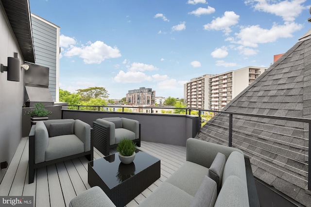 wooden deck with a city view