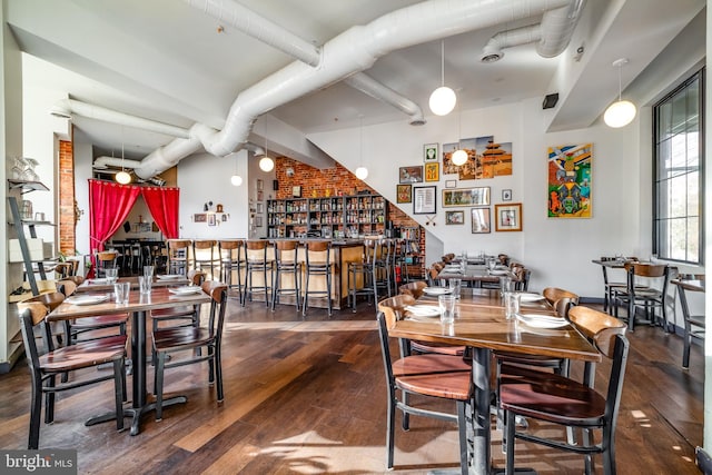 dining area featuring wood-type flooring