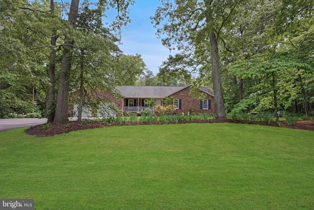 9180 Rolling Meadow Run, Pasadena, MD 21122 - ranch-style home with a front yard and brick siding