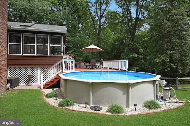 9180 Rolling Meadow Run, Pasadena, MD 21122 - outdoor pool featuring a lawn, a deck, and stairs