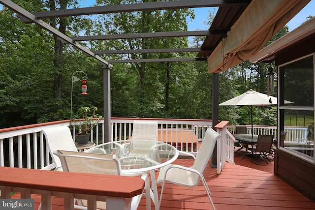 9180 Rolling Meadow Run, Pasadena, MD 21122 - wooden terrace featuring outdoor dining area