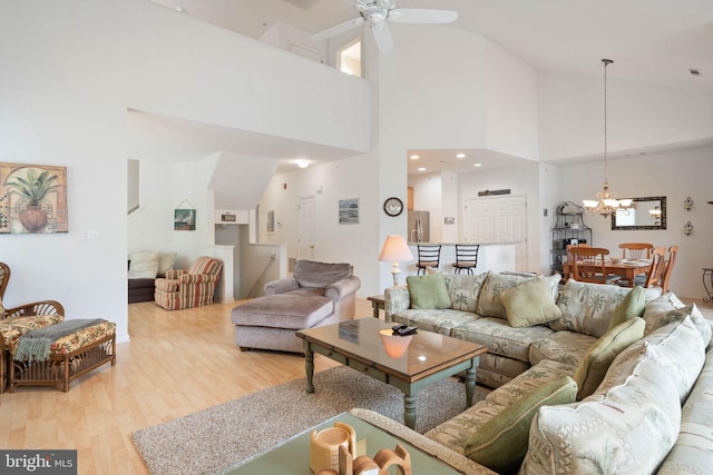 53 Willow Oak Ave Unit 53D, Ocean View, DE 19970 - living room featuring a chandelier, light wood finished floors, a ceiling fan, and high vaulted ceiling