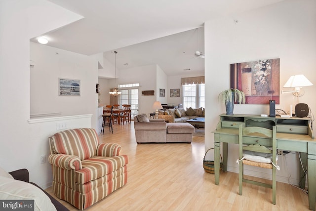 53 Willow Oak Ave Unit 53D, Ocean View, DE 19970 - living area featuring a chandelier, wood finished floors, and high vaulted ceiling