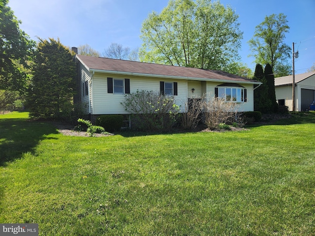 ranch-style home with a front lawn