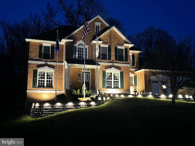 view of front of property with brick siding