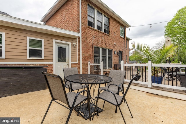 view of patio featuring outdoor dining space