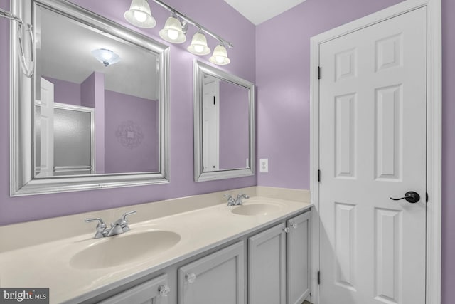 5620 Nutwell Sudley Rd, Deale, MD 20751 - bathroom with double vanity and an enclosed shower