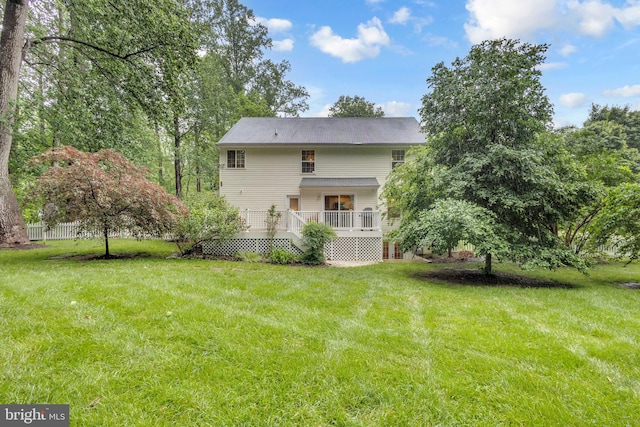 5620 Nutwell Sudley Rd, Deale, MD 20751 - back of house with a yard and a wooden deck