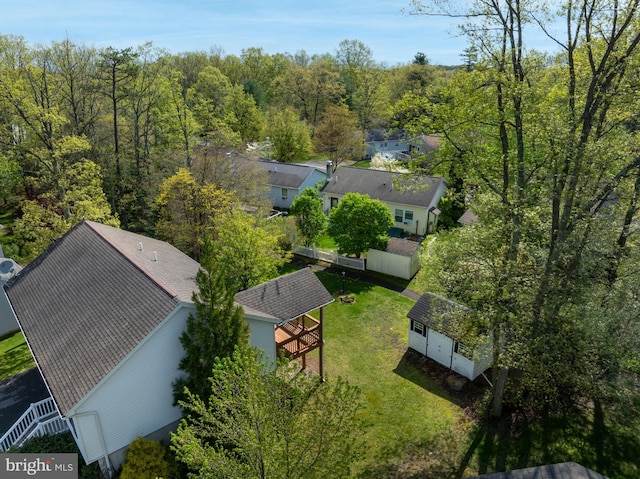 birds eye view of property with a residential view
