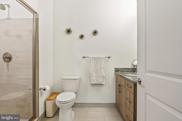 10755 Fairgrounds Dr Unit 320, Fairfax, VA 22030 - full bath featuring toilet, a stall shower, vanity, and baseboards
