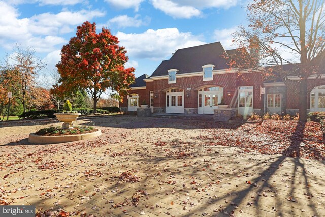 42496 Legacy Park Dr, Brambleton, VA 20148 - view of front of property with french doors and brick siding
