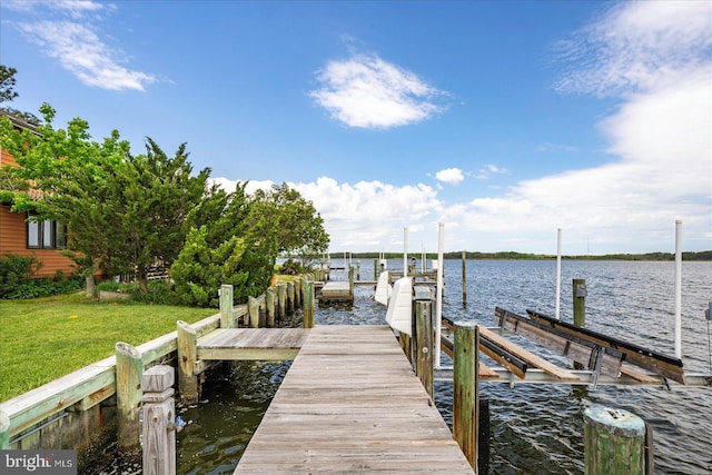 10 Riverside Ct, Ocean Pines, MD 21811 - dock area with boat lift, a water view, and a lawn