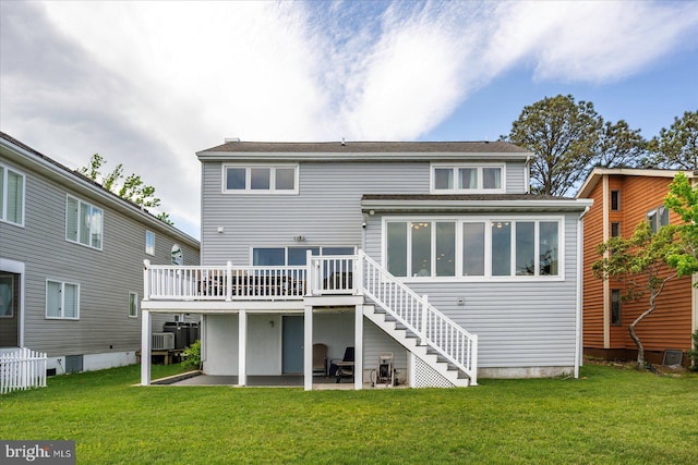 10 Riverside Ct, Ocean Pines, MD 21811 - back of property featuring stairs, a deck, a lawn, and a patio area
