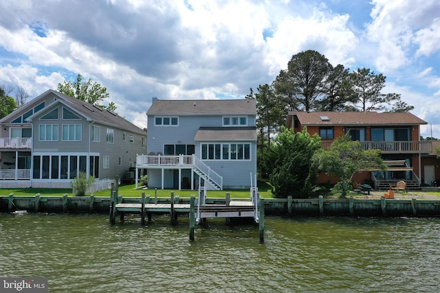 10 Riverside Ct, Ocean Pines, MD 21811 - back of property with stairway, a deck with water view, and a sunroom