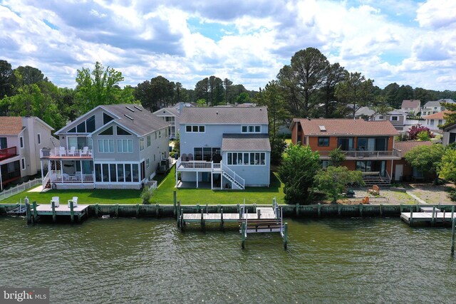 10 Riverside Ct, Ocean Pines, MD 21811 - back of house featuring a sunroom, a residential view, stairway, and a deck with water view
