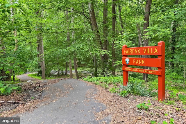 view of community with a view of trees