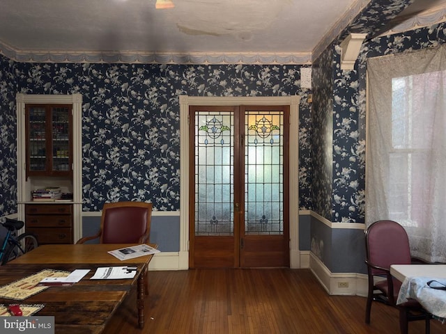 911 E King St, Lancaster, PA 17602 - home office featuring wallpapered walls, hardwood / wood-style floors, baseboards, and french doors